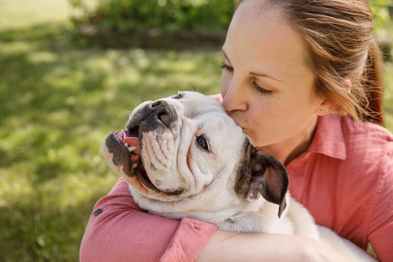 woman-kissing-dog