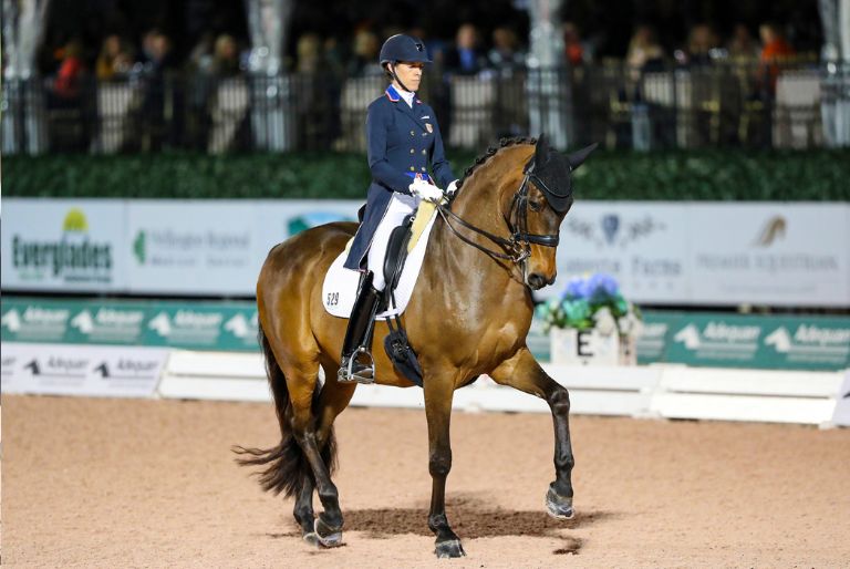 Oliva doing dressage on horse